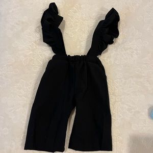 Bailey’s Blossoms black ruffle sleeved jumpsuit 6-9 months